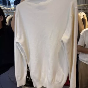 เสื้อคอปีน  สีครีม