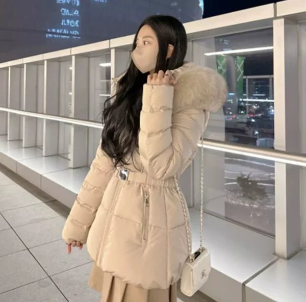 เสื้อกันหนาวขนเป็ด Woman สีเทาโอวัลติน